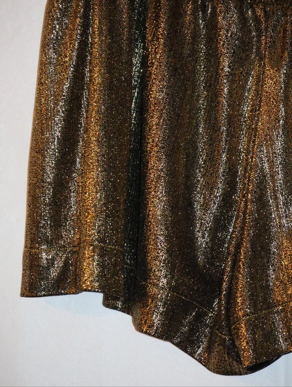 Pants Store High-Waist Shimmery Metallic Gold Fly Away Swing Shorts.